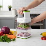 Multipurpose vegetable chopper in use dicing vegetables